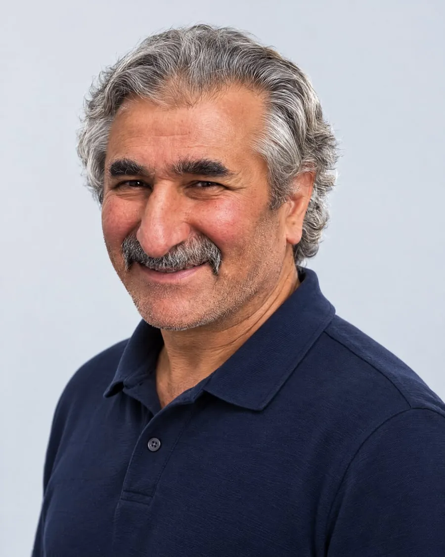 Portrait of Cengiz Bicakci, owner of CB Sicherheitstechnik.